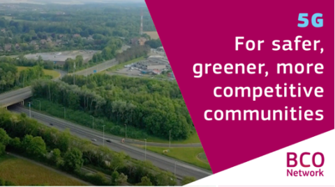 Text over photo of an aerial photograph of the municipality of Wavre in Belgium, showing wide roads and a bridge leading to the citys outskirts, surrounded by forests and fields: 5G: for safer, greener, more competitive communities.