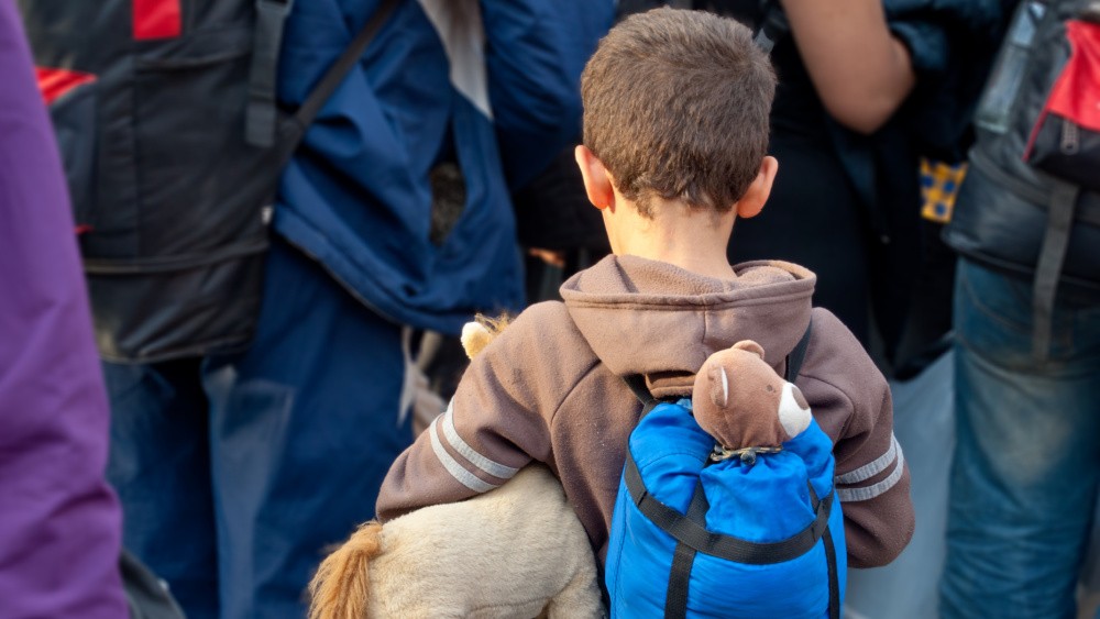 A child seen from behind.