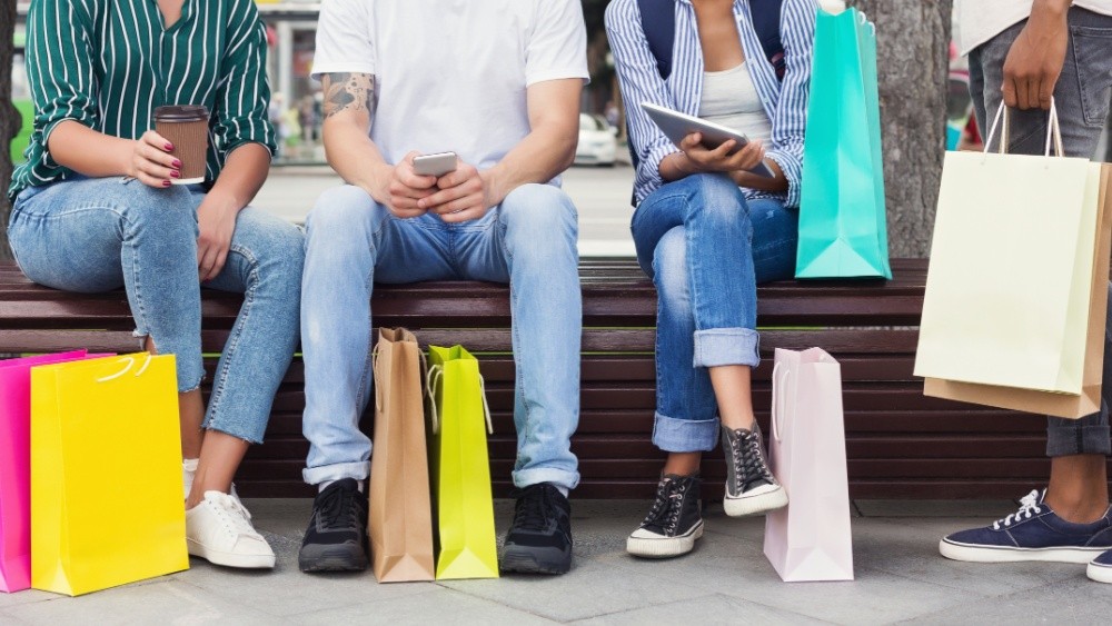 People with shopping bags.