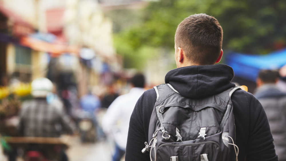 A boy from behind.