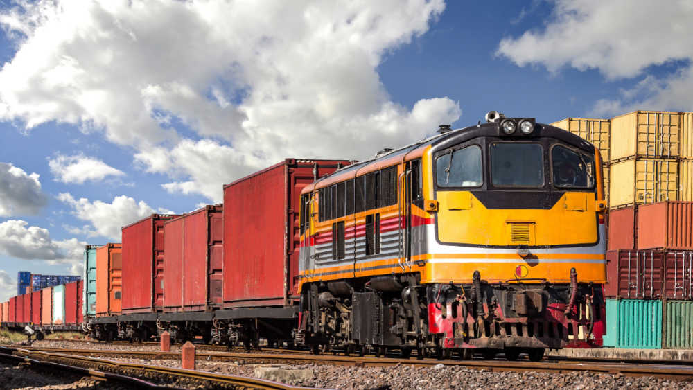 Locomotive pulling containers.