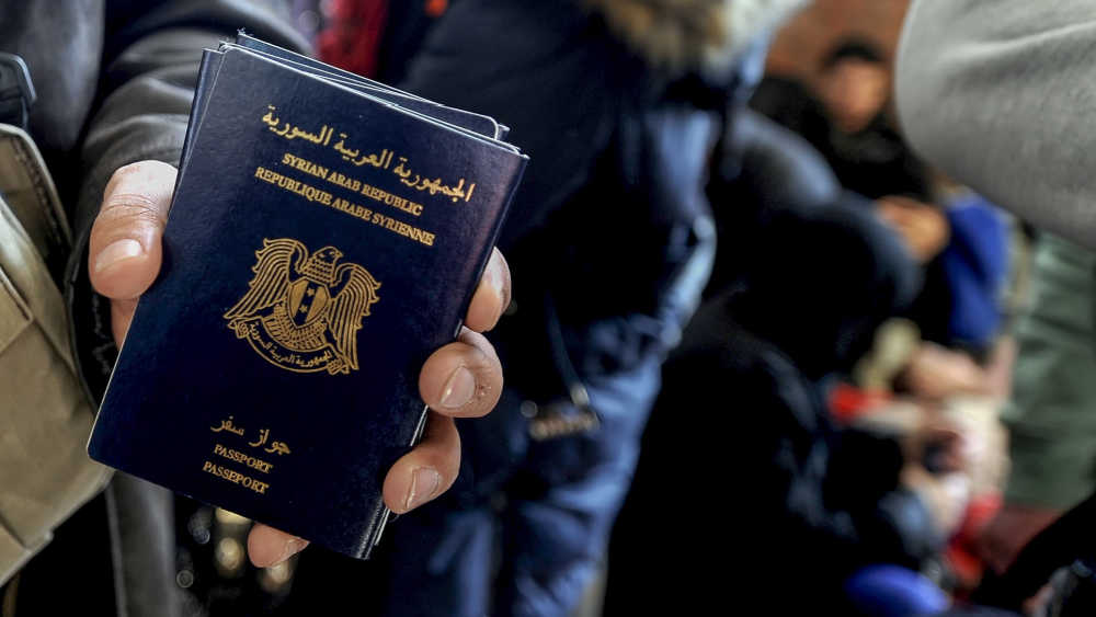 Someone holding a passport.